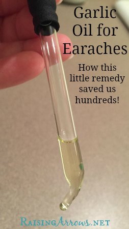 Using garlic oil for earaches has saved us hundreds of dollars - here's the story and the resources to buy or make your own! | RaisingArrows