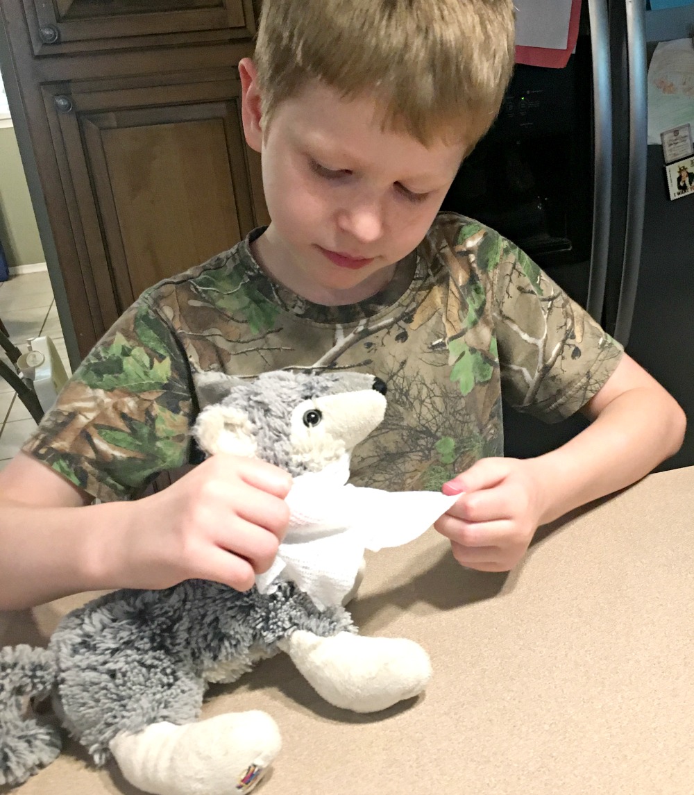 Learning to care for cuts and scrapes with our stuffed animals and The Peaceful Preschool curriculum in this week's Large Family Homeschooling Week in Review!